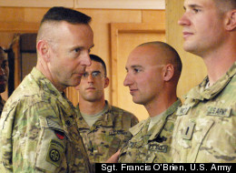 Caption: U.S. Army Capt. Joseph M. Lapoint, executive officer for Charlie Company, 1st Battalion, 24th Infantry Regiment is congratulated for his Combat Infantryman Badge awarded by Brig. Gen. Jeffrey A. Sinclair, Deputy Commanding General, 82nd Airborne Division, at Forward Operating Base Lagman, in Zabul province, Afghanistan, Nov. 24, 2011. (Sgt. Francis O'Brien, U.S. Army)