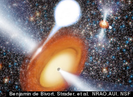 Artist's conception of two black holes in globular cluster.