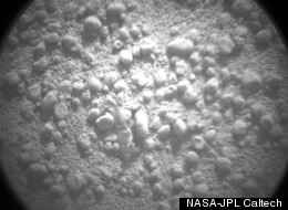 This photo, taken by the Curiosity rover's ChemCam instrument on Oct. 8, 2012, shows a close-up view of the piece (visible slightly below and to the left of the photo's center) that apparently fell off the robot.