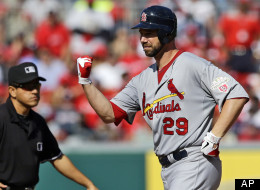 St. Louis Cardinals starting pitcher Chris Carpenter reacts after hitting a double in the fifth inning of Game 3 of the National League division baseball series against the Washington Nationals on Wednesday, Oct. 10, 2012, in Washington.