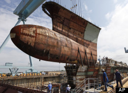 B.C.'s shipbuilding industry is back as crews break ground on new construction at the Vancouver shipyards. Here, shipbuilders in Virginia install a lower bow. (AP)