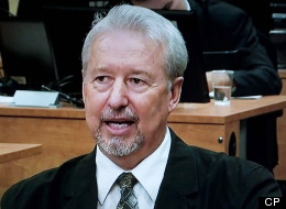 Gilles Surprenant, a retired engineer at the City of Montreal, testifies before the Charbonneau Commission on this image made off television Thursday, October 18, 2012 in Montreal. THE CANADIAN PRESS/Paul Chiasson
