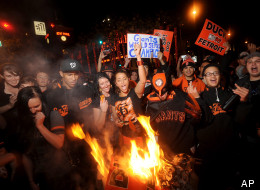 San Francisco Giants fans celebrate outside PacBell Park on Sunday, Oct. 28, 2012, in San Francisco after the Giants swept baseball's World Series against the Detroit Tigers.