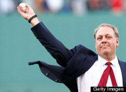 Former Boston Red Sox pitcher Curt Schilling #38 throws out the first pitch after being inducted into the Red Sox Hall of Fame prior to the game against the Minnesota Twins during the game on August 3, 2012 at Fenway Park in Boston, Massachusetts.