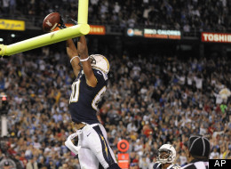 San Diego Chargers wide receiver Malcom Floyd celebrates his touchdown reception against the Kansas City Chiefs, tipping the ball over the crossbar during the second half of an NFL football game Thursday, Nov. 1, 2012, in San Diego.