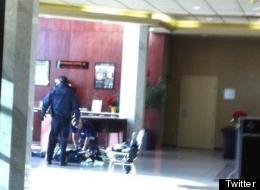 An eyewitness photo of the scene inside a Burnaby hotel after a deadly shooting. (Twitter @timothyw_only1)
