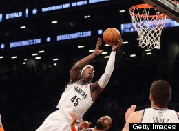 Gerald Wallace #45 of the Brooklyn Nets goes up in overtime but misses the basket against the New York Knicks at the Barclays Center on November 26, 2012 in the Brooklyn borough of New York City.