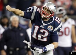New England Patriots quarterback Tom Brady (12) reacts after running for yardage against the Houston Texans during the third quarter of an NFL football game in Foxborough, Mass., Monday, Dec. 10, 2012. (AP Photo/Stephan Savoia)