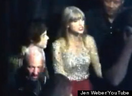 Taylor Swift smooches Harry Styles backstage at Z100's Jingle Ball in NYC.