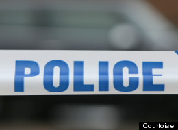 Police have appealed to a suspected armed robber to give himself up after a woman was kidnapped for a time and driven around in her own car.