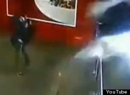 CCTV captured the moment a shark tank in a chinese mall burst.