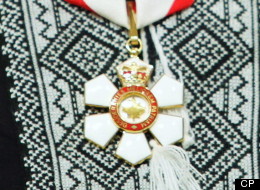 Rock legend Randy Bachman poses with his Order of Canada medal, after it was presented by Governor General Michaelle Jean during a cermony in Ottawa, Friday May 15, 2009. (THE CANADIAN PRESS/Fred Chartrand)