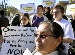 Diana Saravia, 10, of Beltsville, Md., left, demonstrates along with members of immigration rights organizations, including Casa in Action and Maryland Dream Act, demonstrate in front of the White House as they call on President Barack Obama to fulfill his promise of passing comprehensive immigration reform, in Washington, Thursday, Nov. 8, 2012. (AP Photo/Cliff Owen)