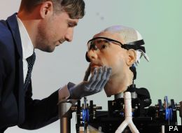 Bertolt Meyer looks at a 'bionic man' modeled on himself at the Science Museum in London.