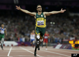 In this Saturday, Sept. 8, 2012 file photo, South Africa's Oscar Pistorius wins gold in the men's 400-meter T44 final at the 2012 Paralympics, in London. Pistorius has been arrested after a 30-year-old woman was shot dead at his home in South Africa. (AP Photo/Kirsty Wigglesworth, File)