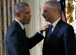 WASHINGTON, DC - SEPTEMBER 25: U.S. President Barack Obama (L) shakes hands with Attorney General Eric Holder (R) after Holder announced his resignation at the White House September 25, 2014 in Washington, DC. Holder has been led the Department of Justice since the beginning of the Obama administration in 2009 and plans to remain in office until his successor is named. (Photo by Win McNamee/Getty Images)